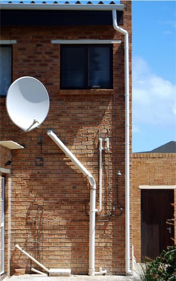 Waste pipework on the exterior of a house.